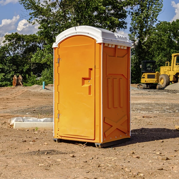 what is the cost difference between standard and deluxe portable restroom rentals in Coram